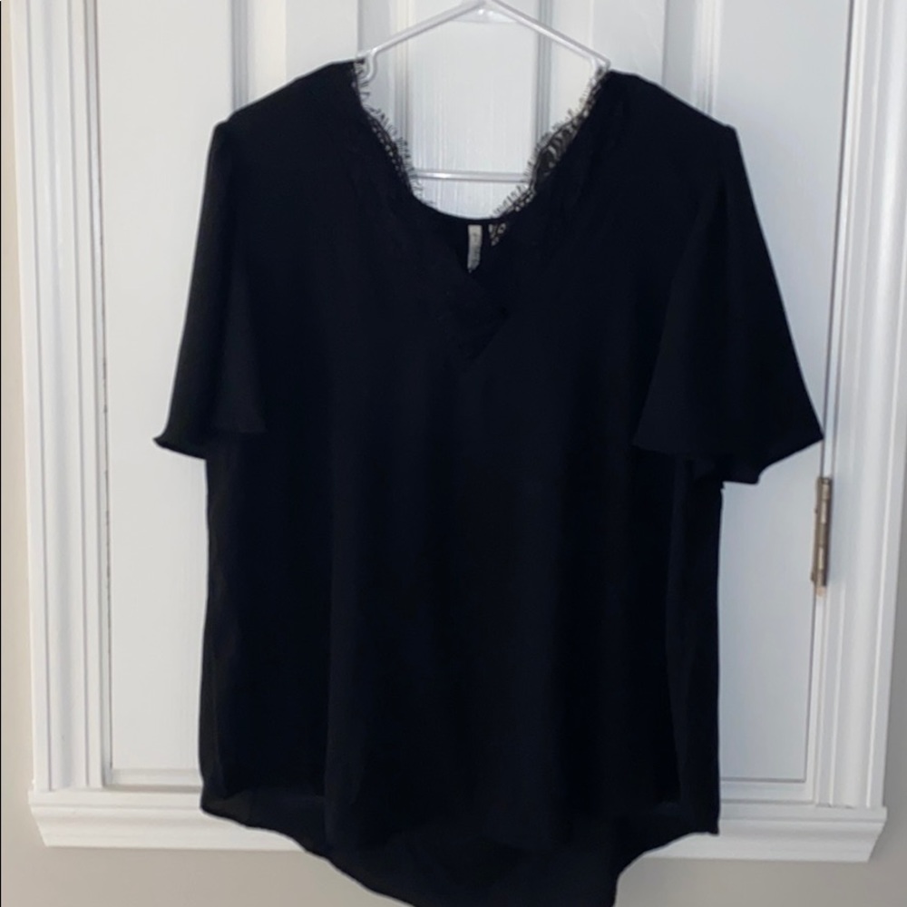 black blouse with lace detail